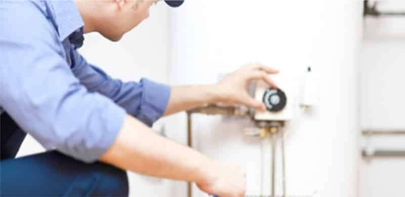 plumber-checking-water-heater