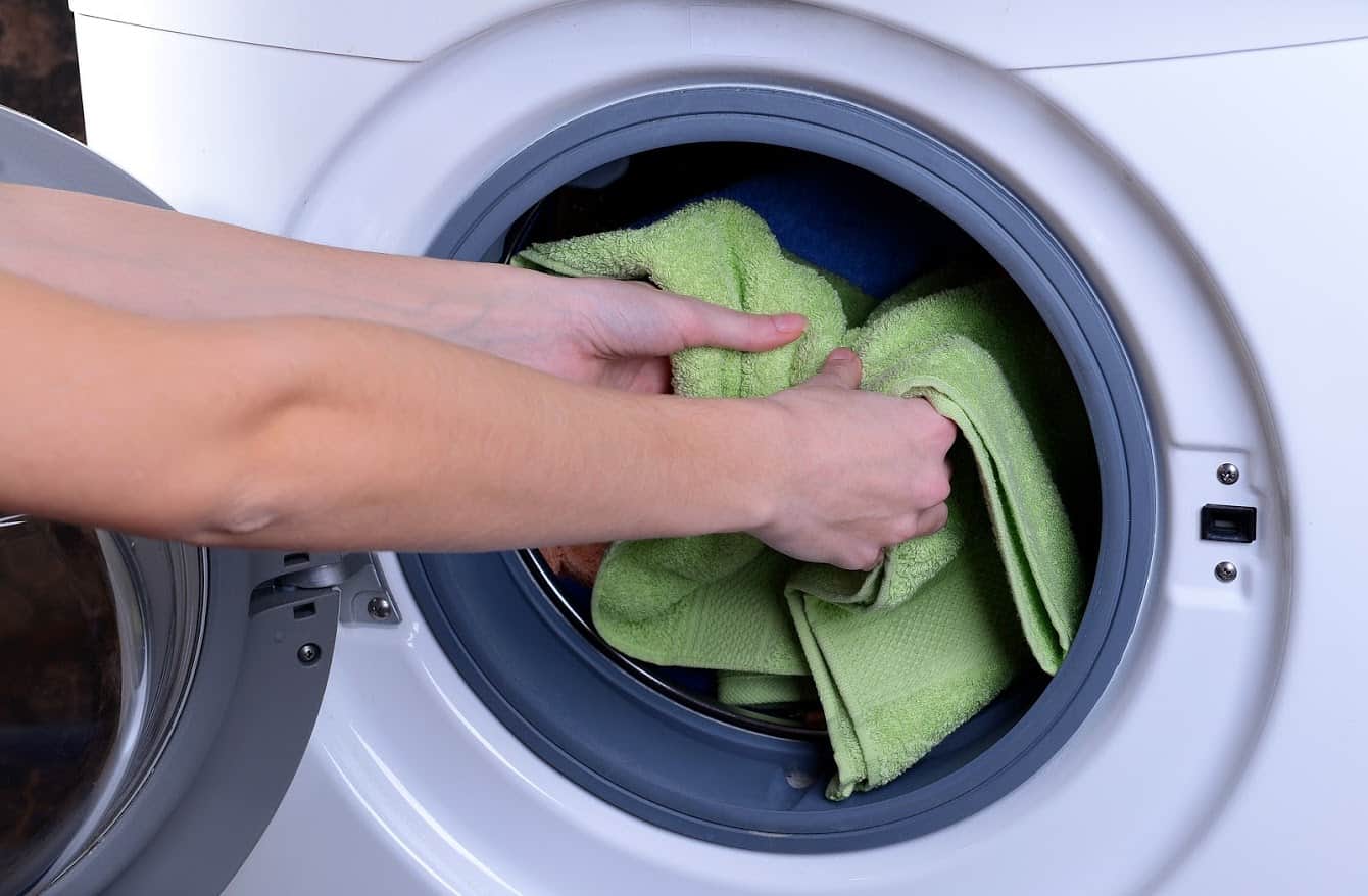 woman-taking-laundry-out-of-the-dryer